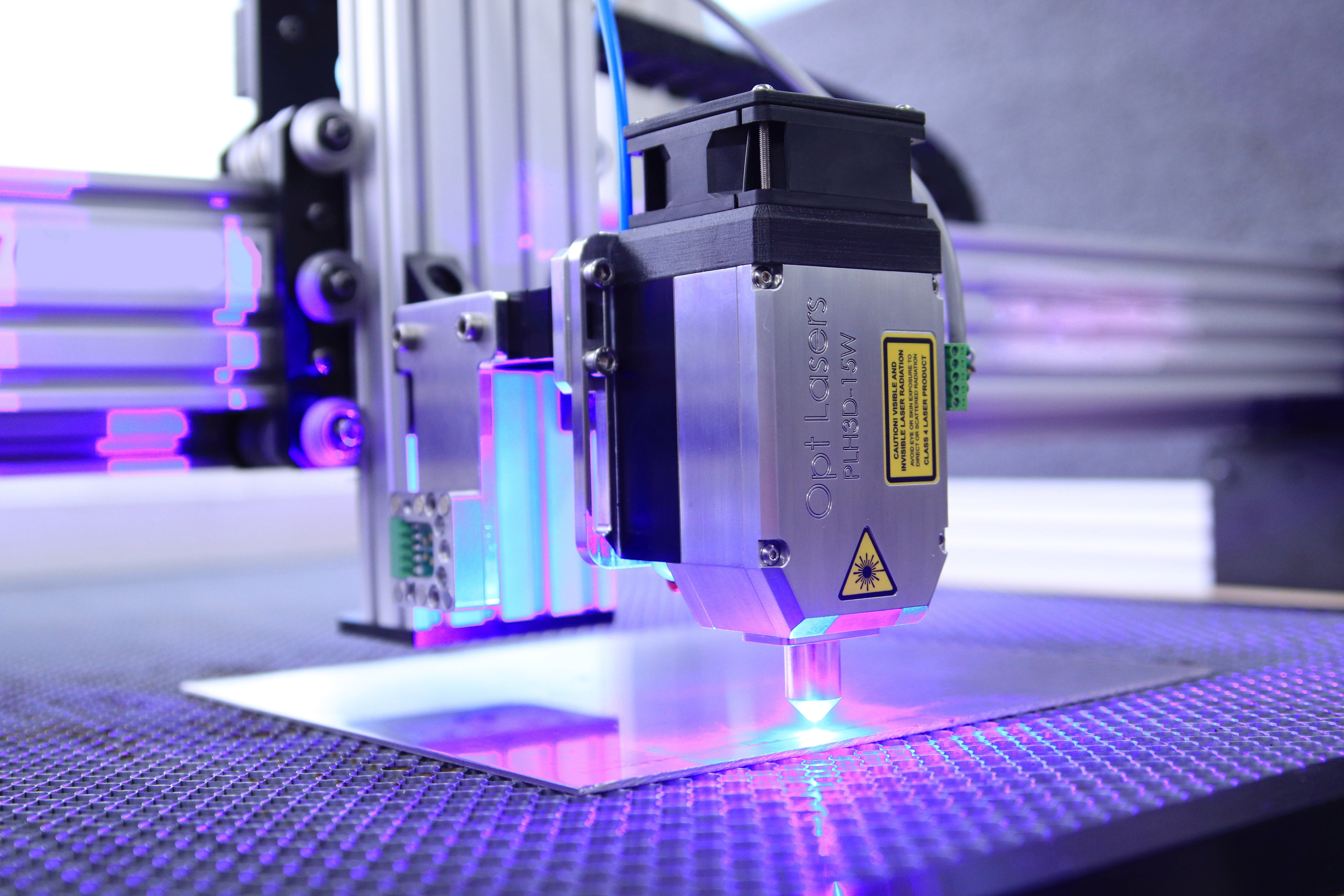 Laser engraving machine with BS Designs' advanced laser technology in operation.